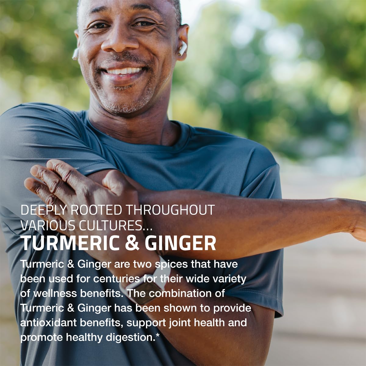 Bronson Turmeric + Ginger capsules in a hand
