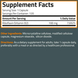 Bronson Vitamin B2 Riboflavin capsules in a hand