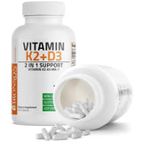Bronson Vitamin D3 & K2 Capsules with a measuring spoon