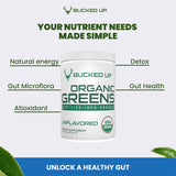 Bucked Up Organic Greens mixed in a glass of water