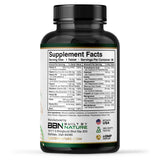 Built by Nature Multivitamin for Men tablet in hand