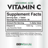 Built by Nature Vitamin C 1000mg tablets on a wooden surface