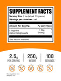 BulkSupplements L-Arginine Alpha-Ketoglutarate Powder side view with serving scoop