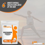 BulkSupplements Vitamin B3 (Niacinamide) Powder in a measuring spoon
