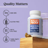 Bulletproof Sleep Mode Softgels with a glass of water
