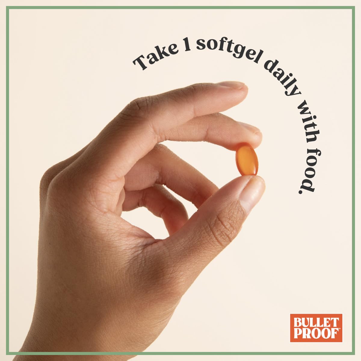 Bulletproof Vitamins A-D-K softgels with a measuring spoon for dosage