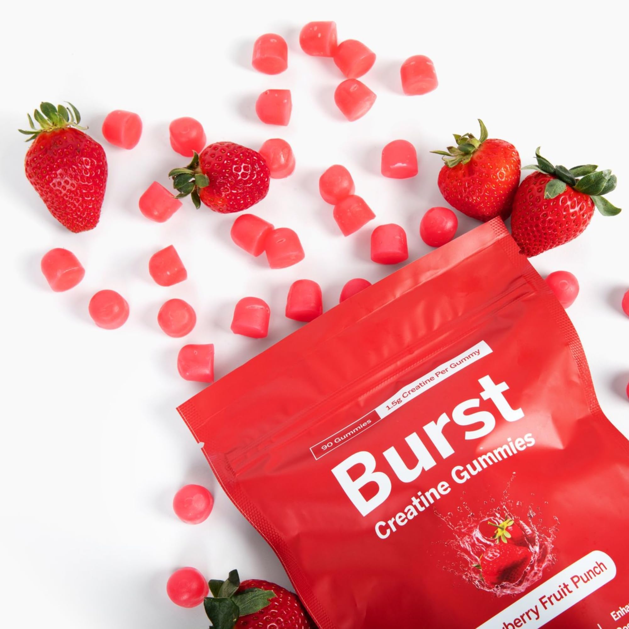 Burst Creatine Strawberry Gummies on a wooden table