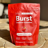 Burst Creatine Strawberry Gummies with fresh strawberries