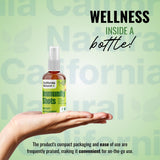 California Natural Ginger Spray held in hand for scale
