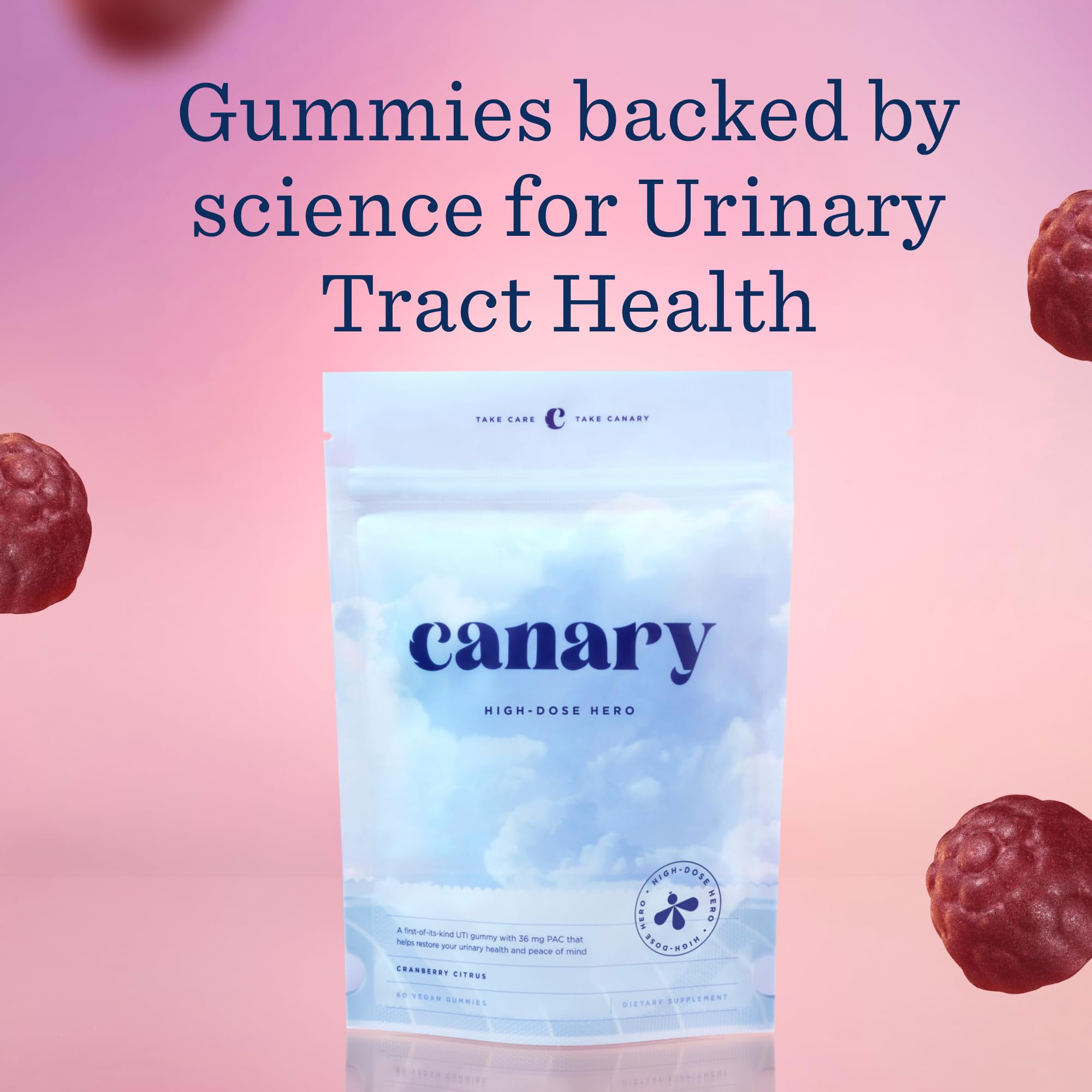 Canary High Dose Hero Cranberry Gummies on a wooden table