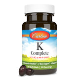 Carlson Vitamin K1 & K2 Supplement on a wooden table