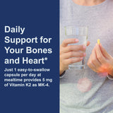 Carlson Vitamin K2 5 mg soy-free capsules in a hand