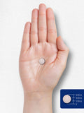 Carlyle Biotin tablets arranged on a wooden surface