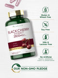 Carlyle Black Cherry Extract 1000mg capsules on a wooden table