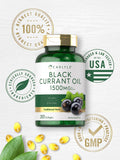 Carlyle Black Currant Oil softgels on a wooden surface