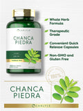 Carlyle Chanca Piedra capsules on a wooden surface