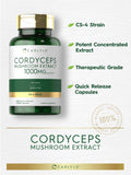 Carlyle Cordyceps CS-4 Mushroom Extract capsules on a wooden surface