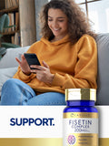 Carlyle Fisetin Complex Blended Vitamin Supplement on a wooden table