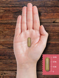 Carlyle Grassfed Heart Supplement bottle with a measuring spoon