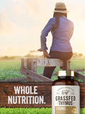 Carlyle Grassfed Thymus & Liver Capsules 2100mg on a wooden table