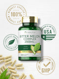 Carlyle Karela Bitter Melon Capsules 1000mg on a wooden table