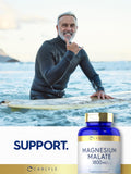 Carlyle Magnesium Malate 1800mg caplets in a hand