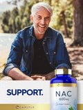 Carlyle N-Acetyl Cysteine 600mg capsules on a wooden table