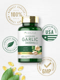 Carlyle Odorless Garlic Softgels on a wooden table
