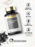 Carlyle Potassium Citrate 99mg capsules on a wooden table