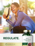 Carlyle Red Yeast Rice 1800mg capsule bottle on a wooden table