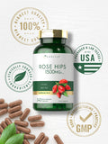 Carlyle Rose Hips capsules in a hand