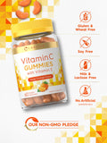 Carlyle Vitamin C + E Vegan Gummies on a wooden table