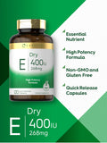 Carlyle Vitamin E capsules in hand for size reference