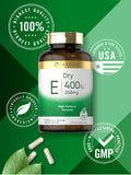 Carlyle Vitamin E capsules pouring from bottle
