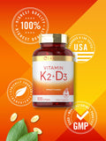 Carlyle Vitamin K2 + D3 Softgels with a measuring spoon
