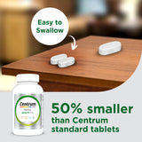 Centrum Minis Silver Multivitamin bottle with a measuring spoon for dosage