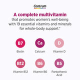 Centrum Multivitamin + Hot Flash Support bottle on a wooden table