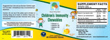 Child holding Raise Them Well Multivitamins chewable tablet