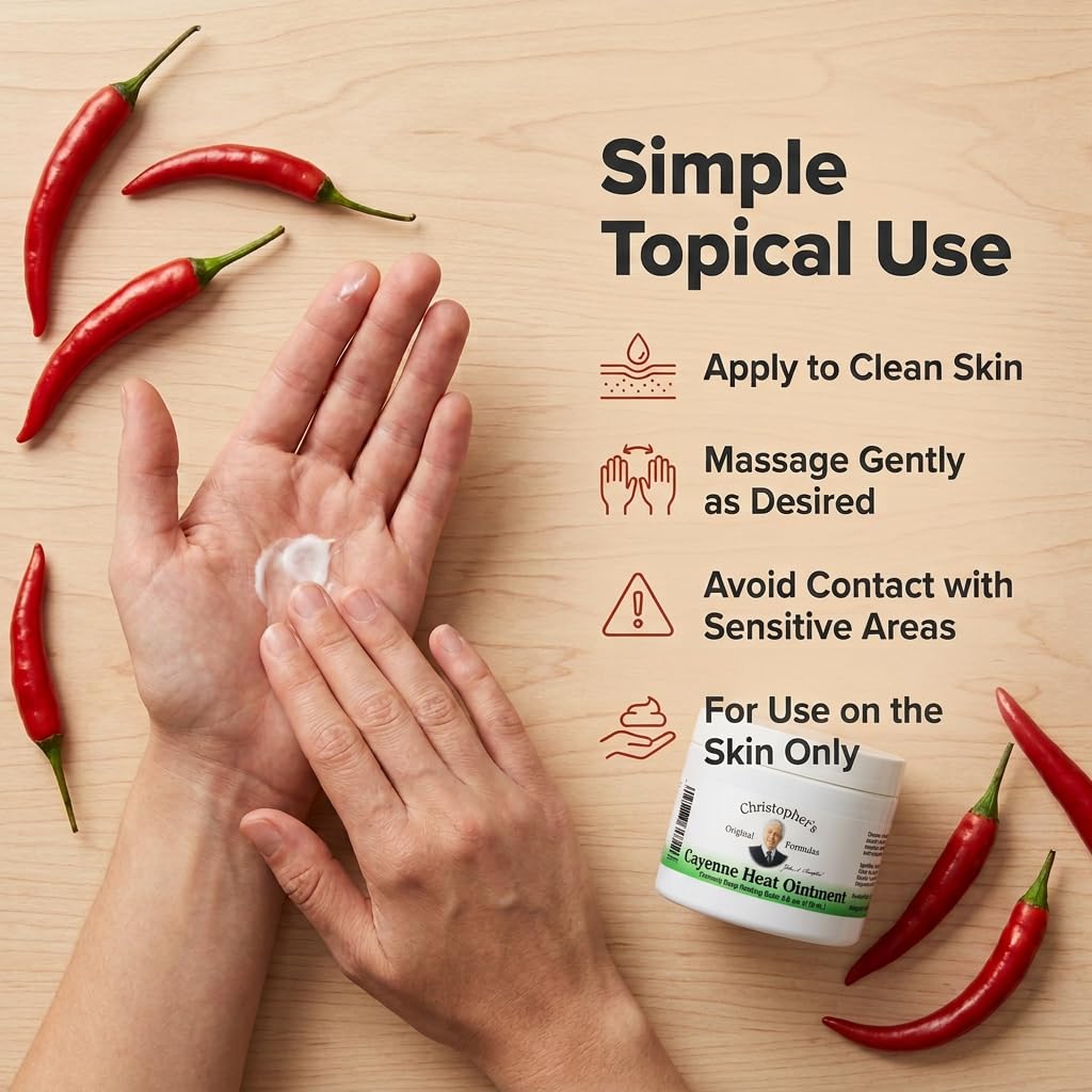 Christopher's Cayenne Ointment on a wooden table