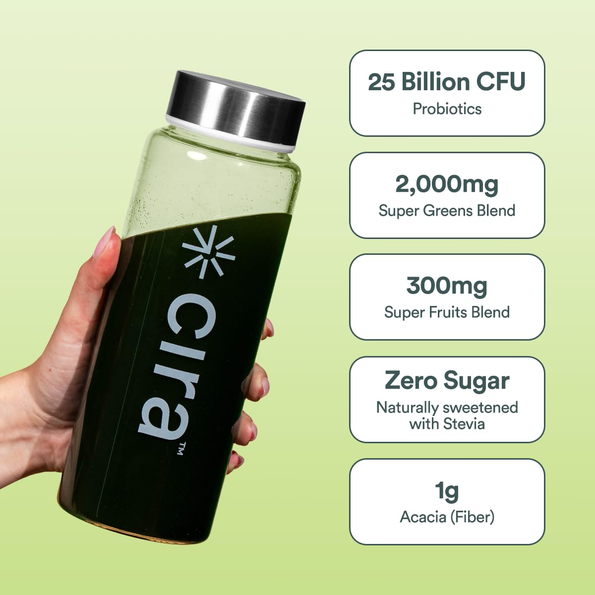 Cira Greens Superfood Powder 70g scoop next to a glass of water
