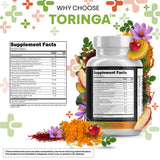 Clean Nutraceuticals Moringa + Turmeric Curcumin capsules on a wooden table