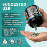 Clean Nutraceuticals Sea Moss Capsules lifestyle scene with a glass of water