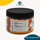 Close-up of Amazing Herbs Black Seed Oil Gummies showing texture