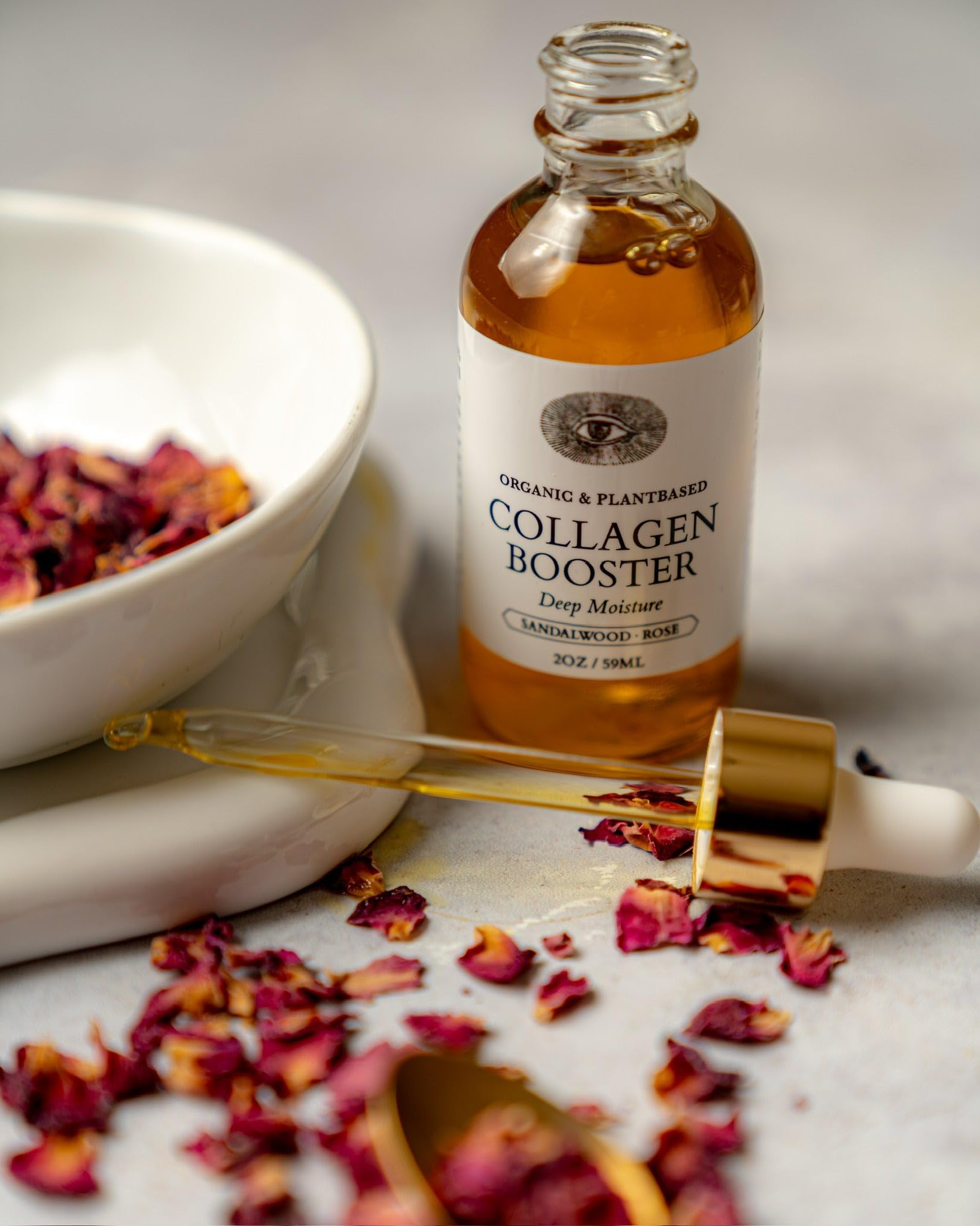 Close-up of Anima Mundi Collagen support Face Oil dropper