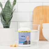 Close-up of BOB'S BEST Coral Calcium caplets in hand