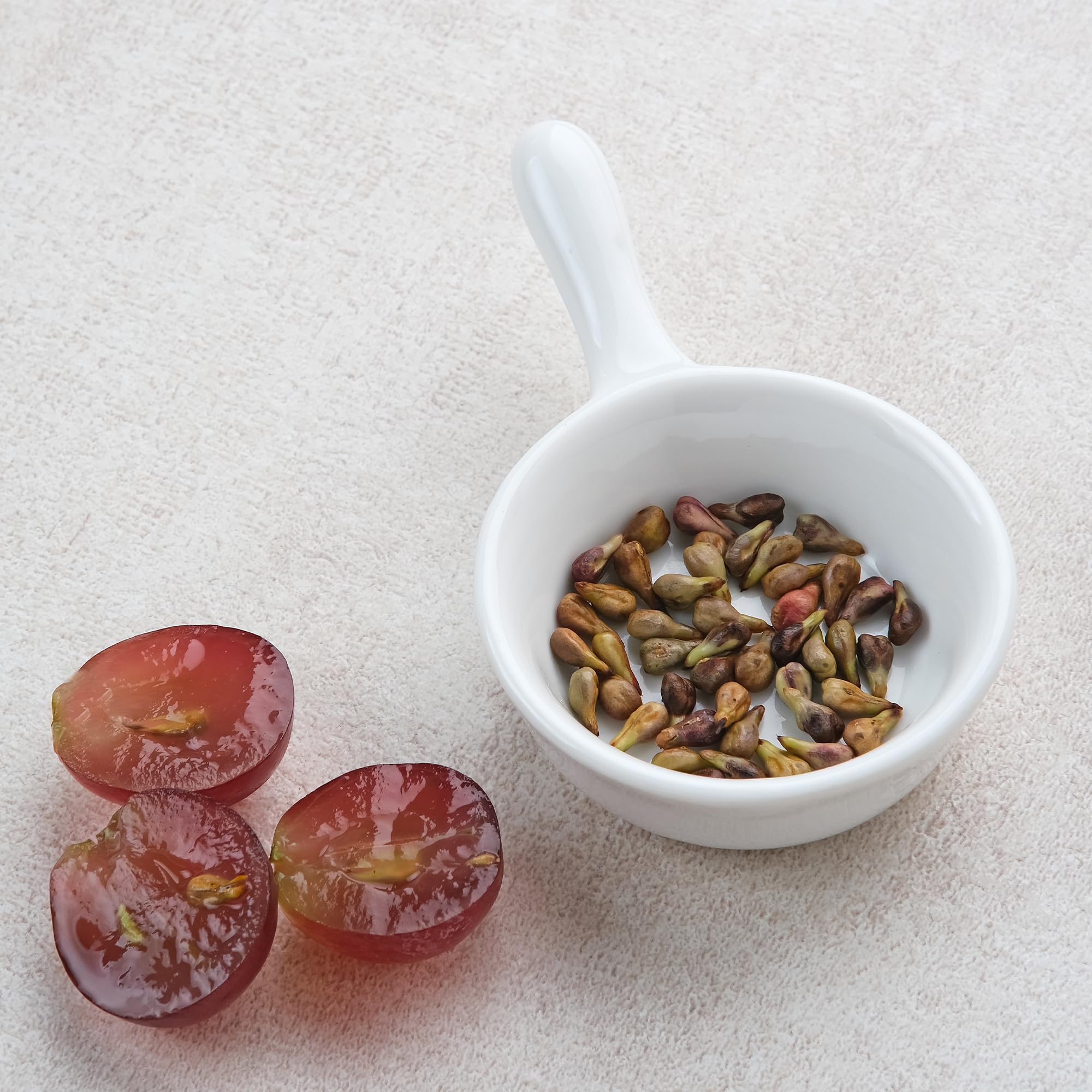 Close-up of Earthborn Elements Grape Seed Extract capsule