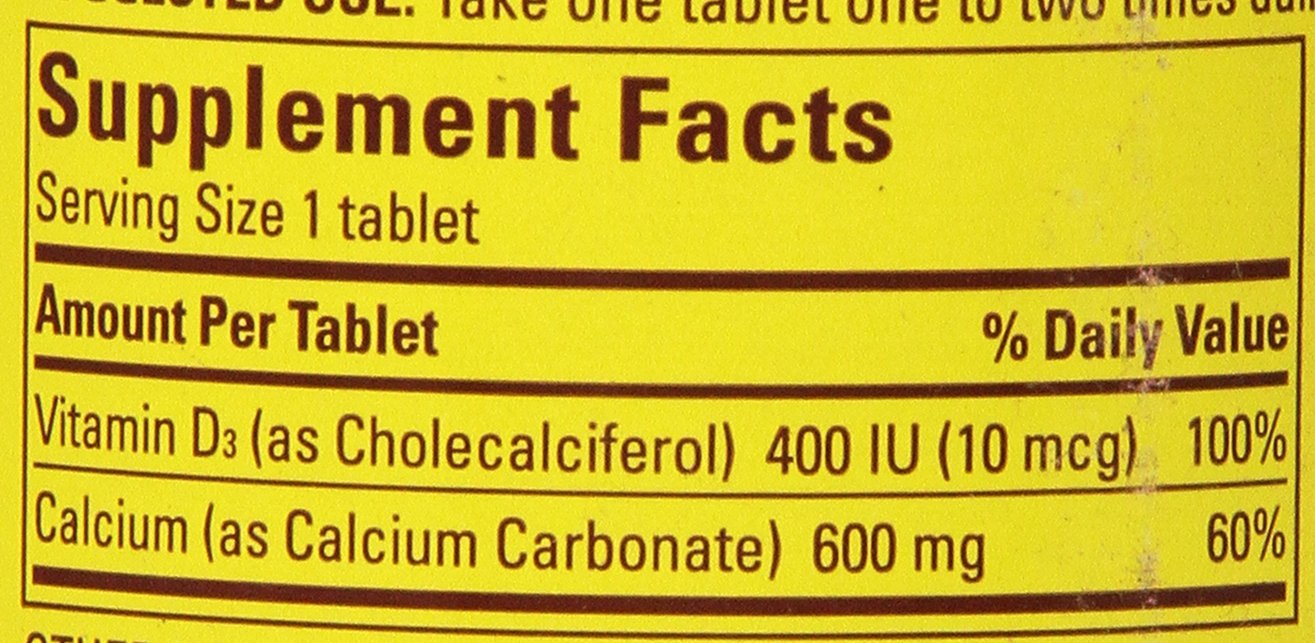 Close-up of Nature Made Calcium 600 mg with Vitamin D Tablets