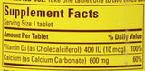 Close-up of Nature Made Calcium 600 mg with Vitamin D Tablets