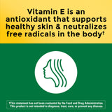 Close-up of Nature Made Vitamin E softgel capsule
