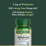 Close-up of Nature's Bounty Melatonin tablets in cherry flavour